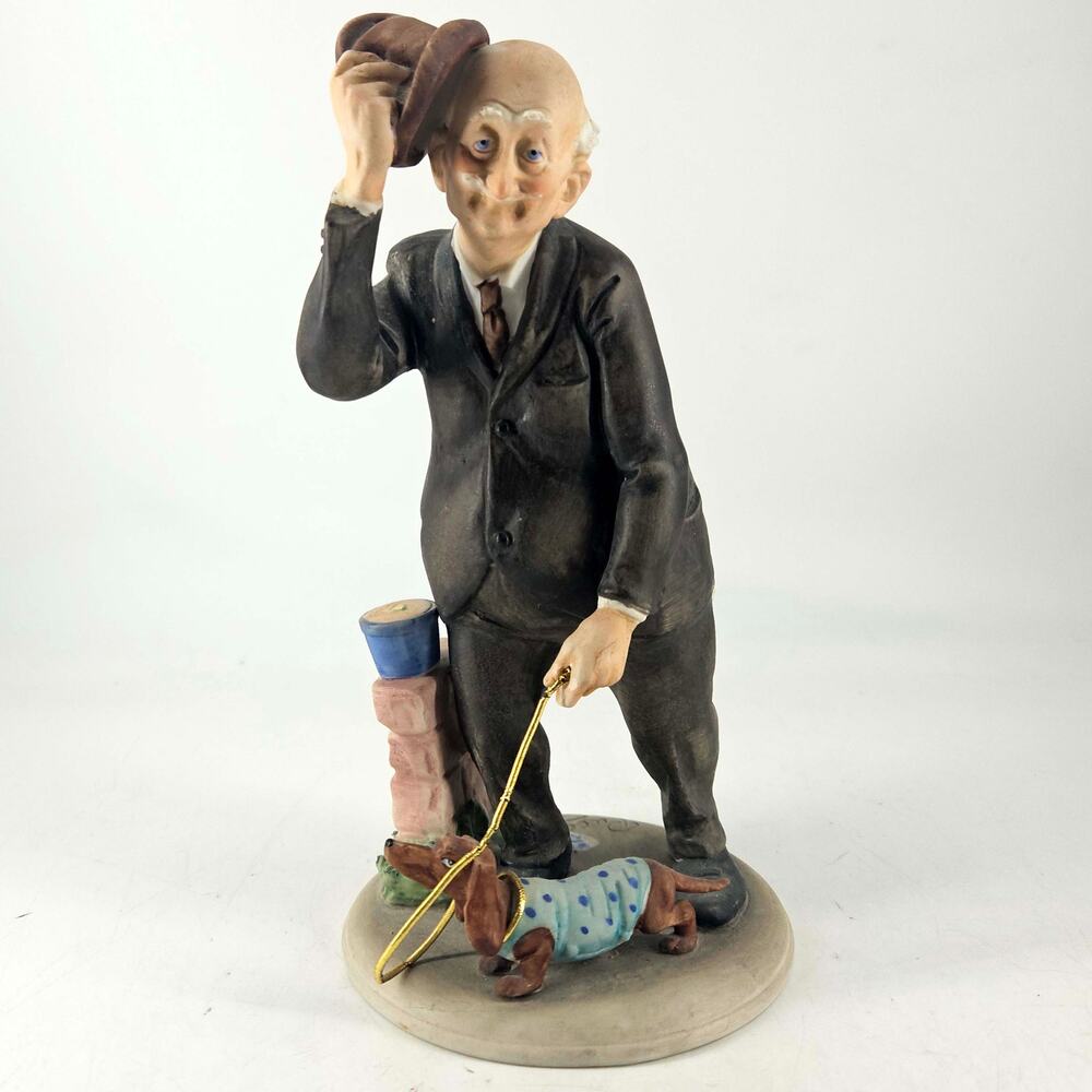 Vintage hand painted Pucci porcelain Capodimonte figurine titled The Bon Vivant